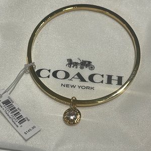 New with tags Coach bangle bracelet with charm